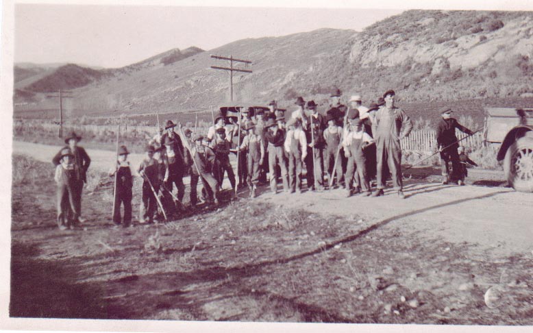 Workers Alongside the Road